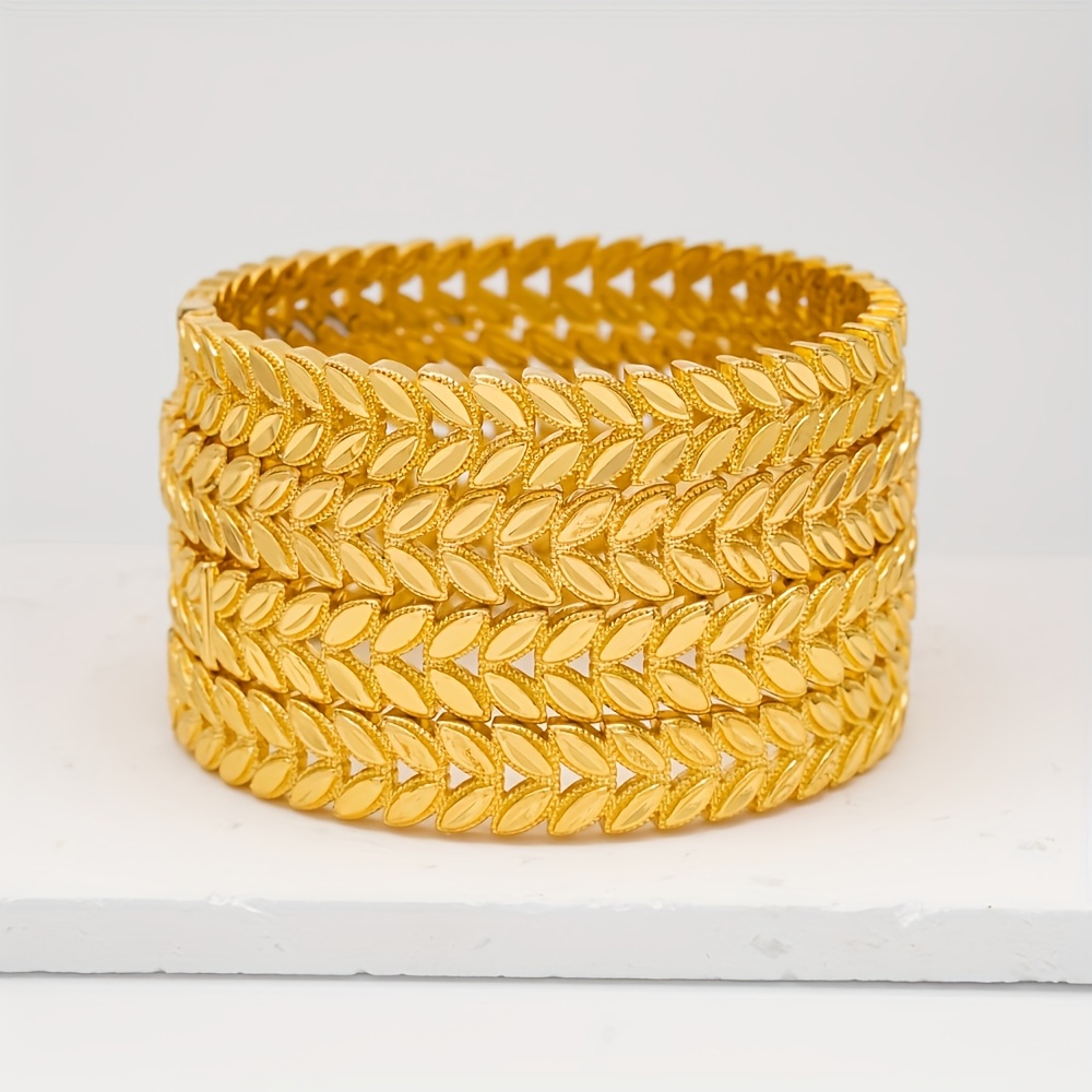 Adjustable Cuff Bracelet with Intricate Leaf Pattern